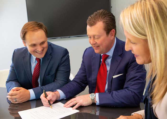 The Miser Tax Advisory team collaborating in a client meeting